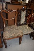 19th century priory or refectory style chair having cabriole legs fret worked back with barley twist