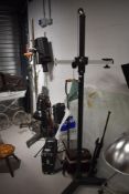 A collection of photographic or film studio lights and accessories