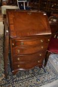 A reproduction Regency style dwarf bureau