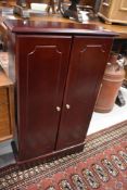 A modern laminate media storage cupboard