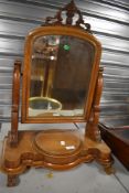 A Victorian satinwood toilet mirror and selection of mahogany mirror frame parts