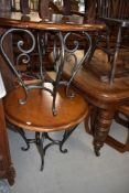 A pair of modern wine or side tables having wrought iron bases with hard wood tops