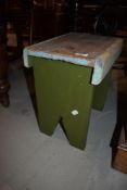 An early 20th century foot stool partially painted