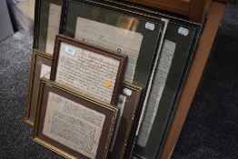 A selection of framed 18th century legal documents and indentures with Westmorland and Cumberland