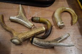 Five bone or antler walking stick handles