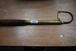 A brass Gaff made by C Farlow and co London