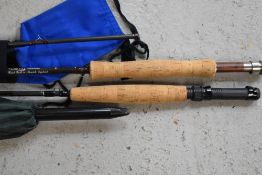 A Greys 2 pc 10ft #7 graphite fly rod 'montana' in soft sleeve and a and a 2pc Caperlan Fly rod