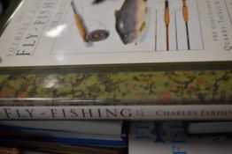 A small box of fishing and shooting related books