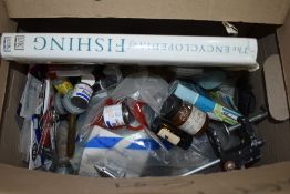 A box containing a mixture of fishing tackle including Line , ledgers, hooks, priests, tools and a
