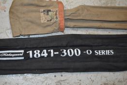 A shakespeare 1841-300 o series 3pc spinning rod and a milbro fibreglass spinning rod