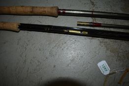 An Edgar Sealey glane fly rod in sleeve and a Shakespeare 2.75m fly rod