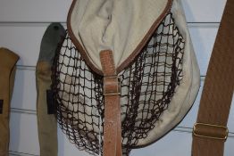 A game bag with string front pouch