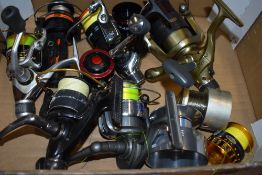 A Shakespeare Agility spinning reel with s spare spools plus 5 other spinning reels including