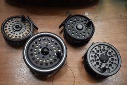 A selection of 4 fly fishing reels including shakespeare and Daiwa