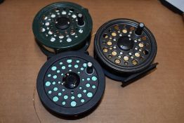 Three Shakespear fly reels with line