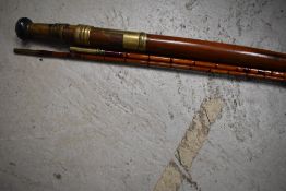 A nice quality unmarked cane 3pc fly fishing rod in unmarked sleeve