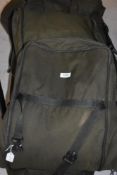 An Avid Carp Rod and tackle Tansit S+ padded transport system with a Grand Slam bag