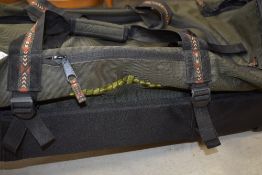 A Snowbee xs rod and reel sleeve and Large Snowbee Tackle case with wheels
