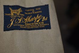 A 2pc 9ft 6in #6 split cane rod entitled 'the Scottie' by J S Sharpe in a hardys canvas sleeve