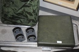 A padded fishing seat with built in tray called The Rutland a pair of magnetic roof rod mounts a
