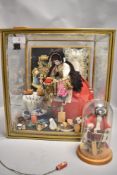 An early 20th century cased peddler doll in case having porcelain head with an assortment of
