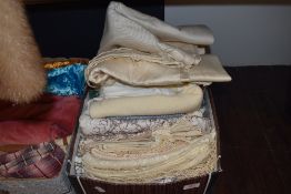 A selection of lace work, crotched and similar table cloths and linnen
