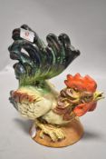 An early 20th century ceramic cockerel figure signed E&S Italy possibly Capodimonte or similar