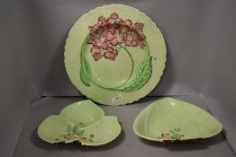 Three 20th century Carlton ware dishes two in the form of leaf in the Australian design and a larger