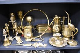 A selection of 20th century brass wares including French style horn, chamber stick and fish kettle