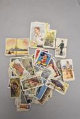 A selection of early 20th century cigarette cards including Wills and Carreras