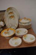 An early 20th century part dinner service by Shelley in the Cape Gooseberry pattern