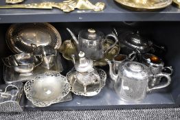 A selection of silver plated table wares including tea set, pierced dishes and cheese wedge
