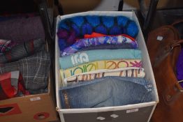 A selection of modern ladies jumpers, jeans and knit ware