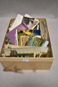 A good selection of early 20th century postcards including black and white photo, military and