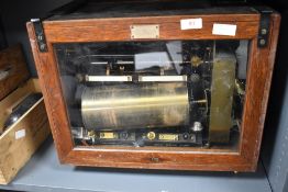 A Vintage Seismograph by the Cambridge Scientific Instrument Co . Case is locked and no key