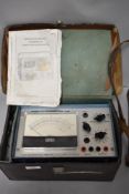 A Lovell DC Multimeter type TM9B in leather case