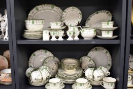 A Royal Doulton Countess pattern part dinner tea and breakfast service over two shelves appears