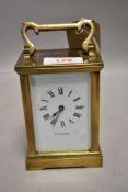 A 20th century Jean Renet brass and glass cased carriage clock with visible platform escapement