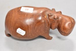 A hippopotamus or hippo figure in carved hard wood