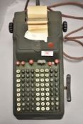 A Vintage Addo Calculator made by Agrell Machine Co Ltd