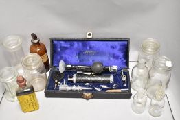 A selection of 20th century medical items including Belosan, Klinostik Super Diagnostic and medicine