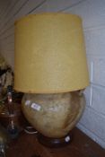 A mid century middle eastern table lamp made from Cammel
