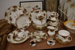 An early 20th century part dinner service by Royal Albert in the Old Country Roses pattern