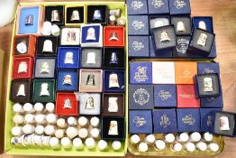 A collection of sewing thimbles including cased sets by Sutherland, Westbury and Vale fine China