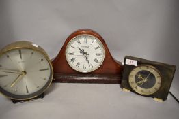 A selection of clocks including Napoleon Windsor clock, Metamec mid century and similar