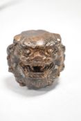 A Japanese design wooden okimono or ojime in the form of a dragons head or Kylin