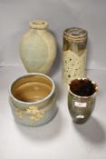 A selection of 20th century studio pottery including hand thrown vase, storage container, planter