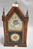 A late Victorian American gothic style mantle clock having thirty hour time piece by Welch