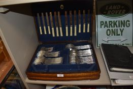 A Mappin and Webb canteen of cutlery in oak case
