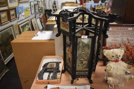 A 20th century Chinese lantern having carved wood frame with hand painted glass panels of geisha